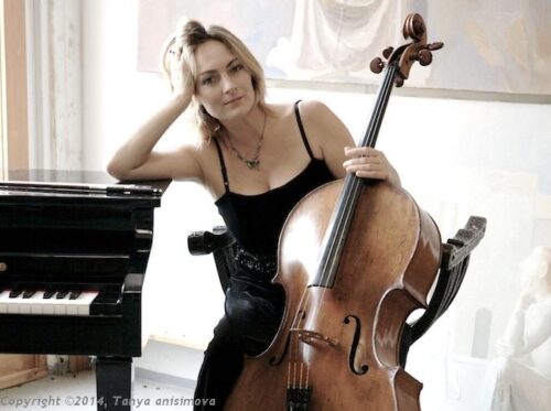 tanya anisimova leaning against piano w cello
